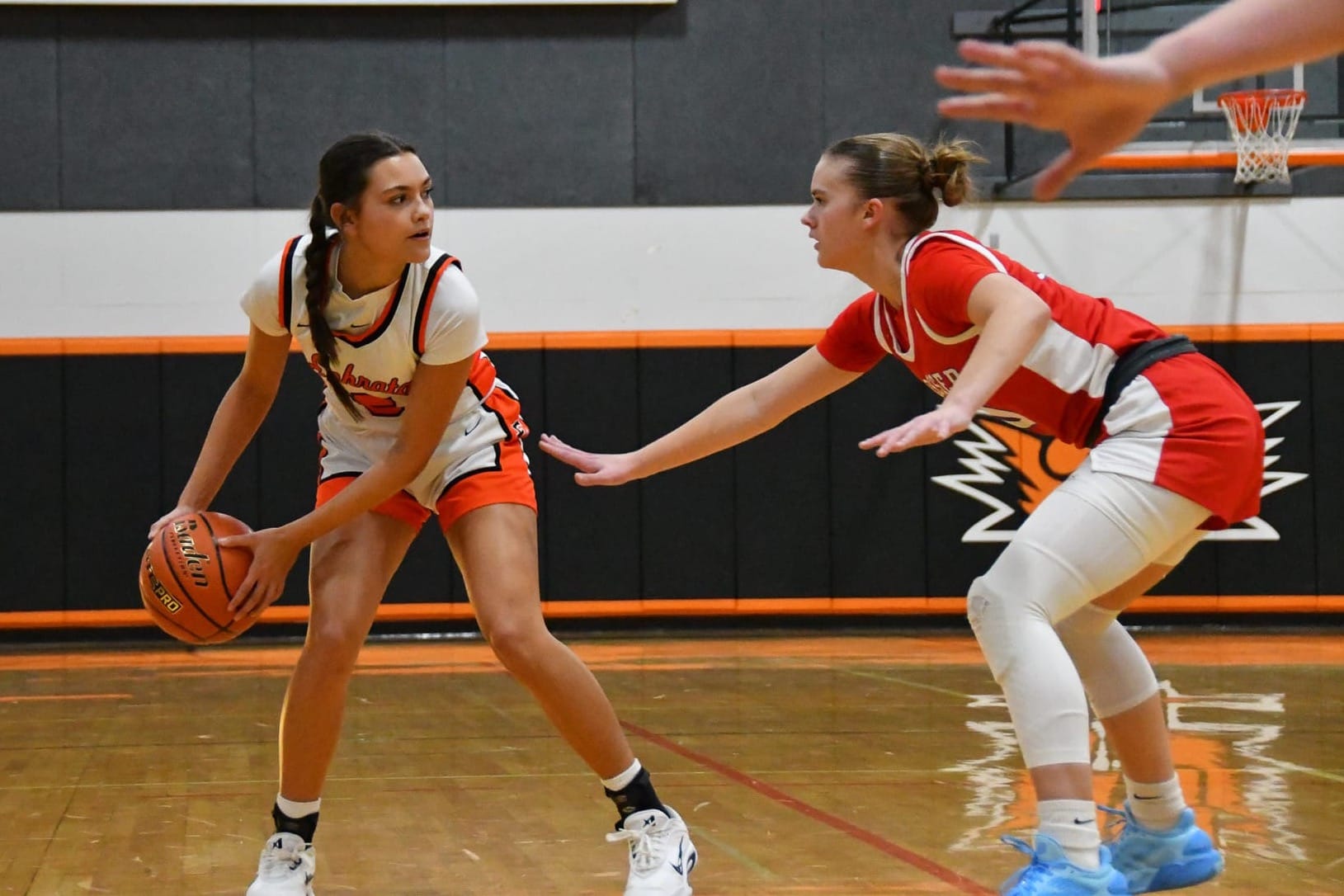 Ephrata's Hannah Malone (5) looks to pass around Prosser 1,000 point standout Herbie Wright (10).
