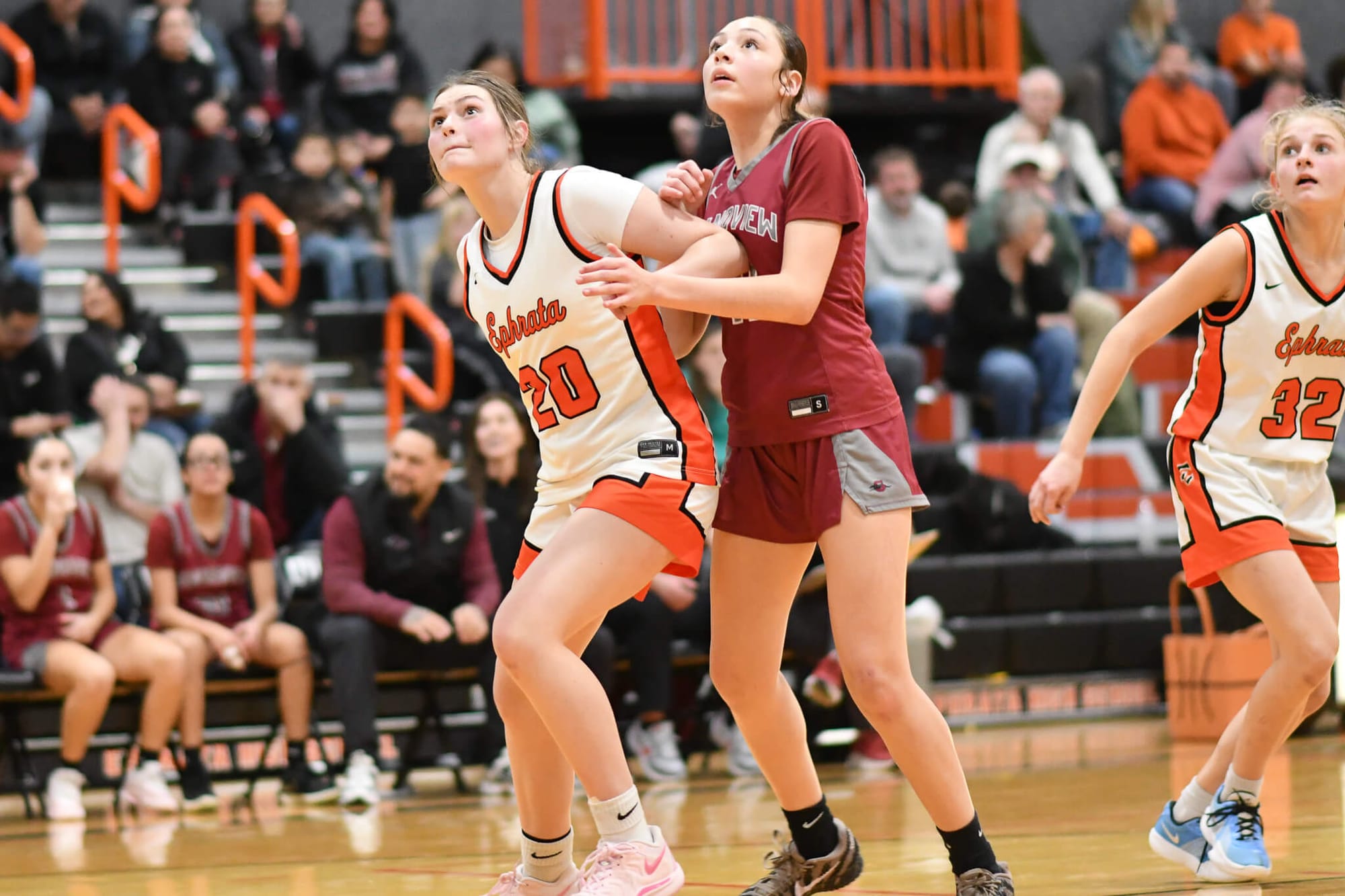 Cassidy Cox (20) jockeys for position under the Grandview basket.