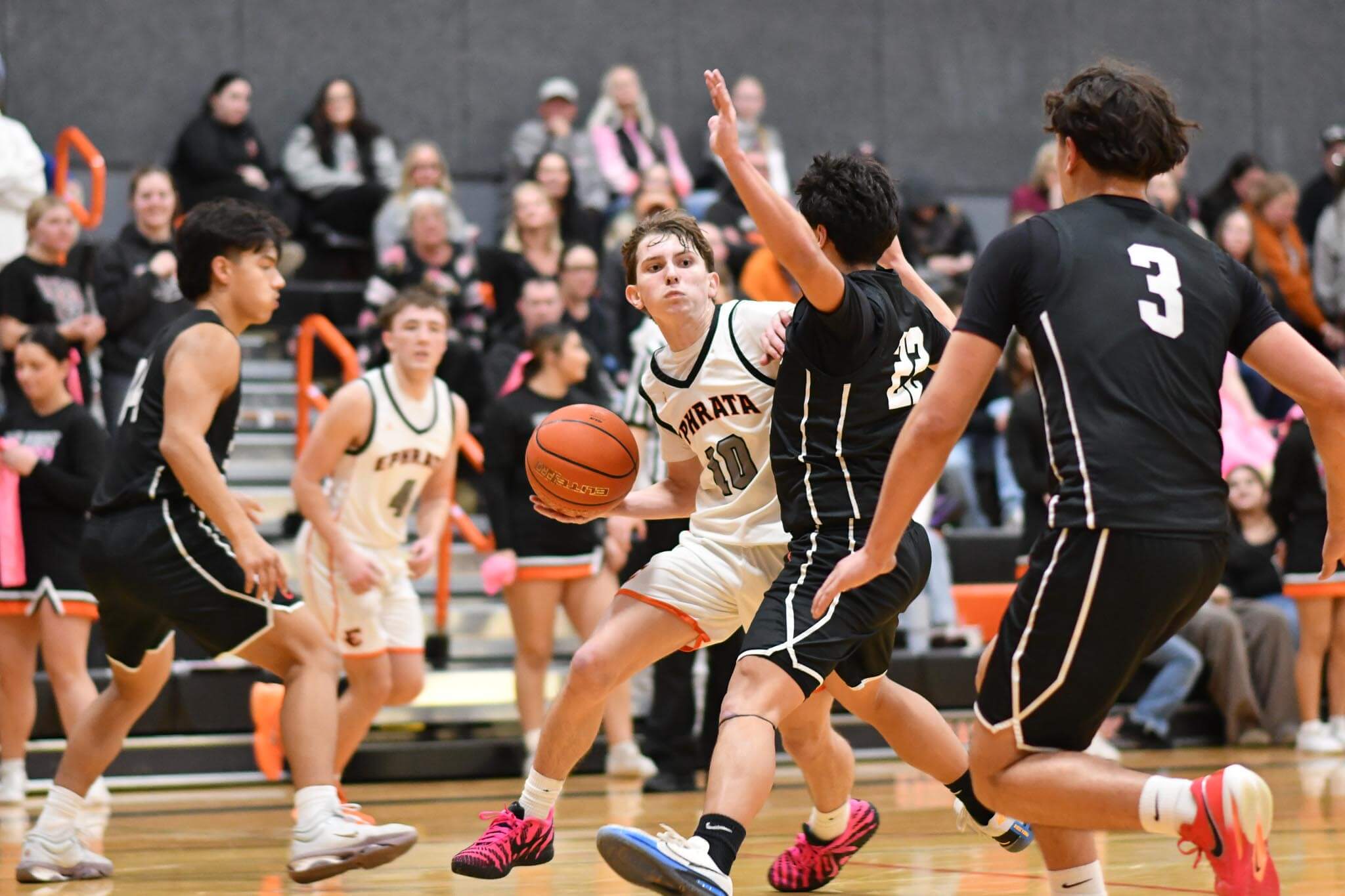 Cooper Black surveys the floor against Othello. Black finished with 12 assists across the three-game stretch.