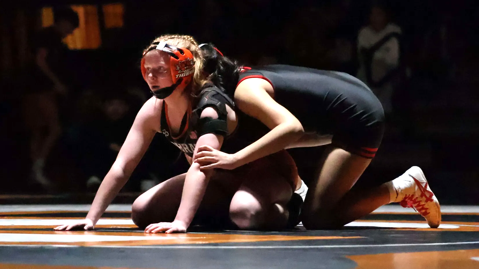 Lady Tigers roll past East Valley; mat showdown looms at Quincy