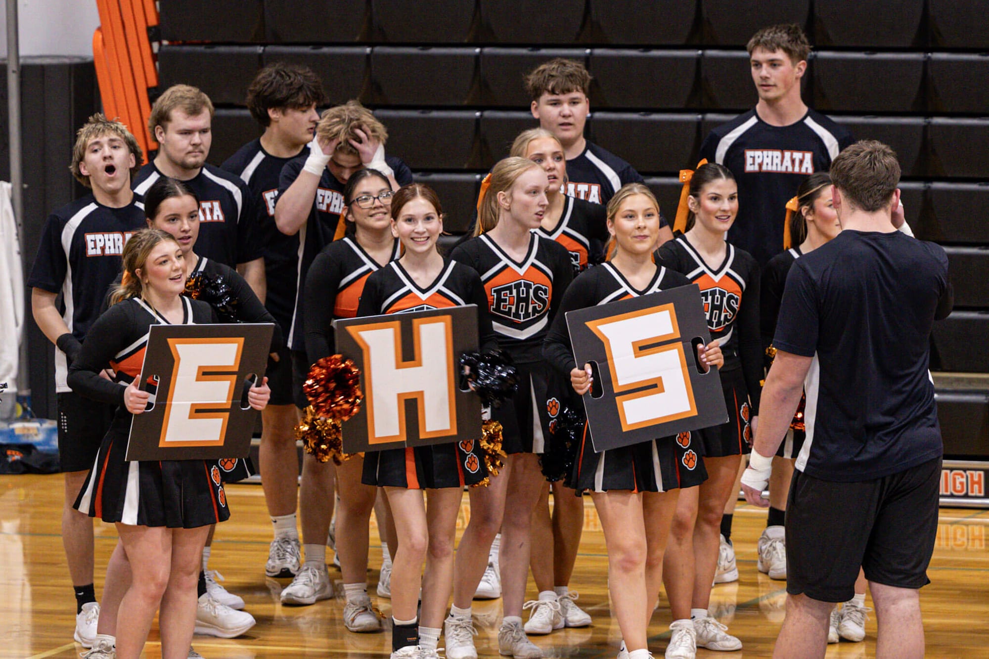 The Ephrata High School cheer and stunt team prepares to take the mat during a community showcase performance Wednesday, Feb. 4, at Ephrata High School. The showcase gave the team a chance to perform their Tumbling and Game Day routines before heading to the WIAA State Cheer Championships in Battle Ground.
