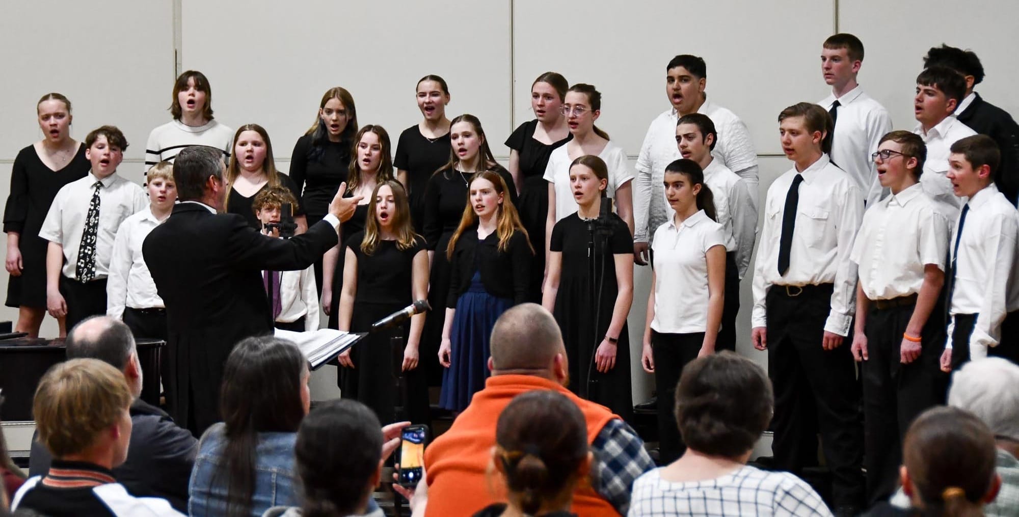The Ephrata Middle School Choir opens the 2026 Spring Concert Monday at EHS PAC gym, performing three numbers including soloists Nora Sackman and Anderson Bair. Photos by Casey Devine