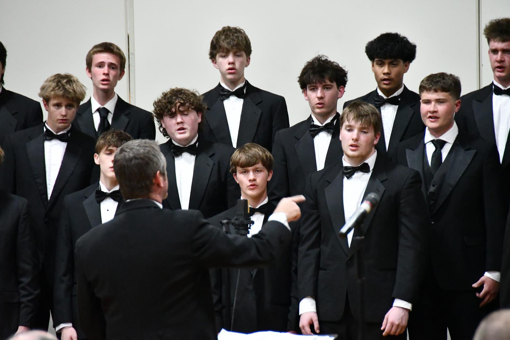 Men of the EHS Concert Choir join for a three-song set.